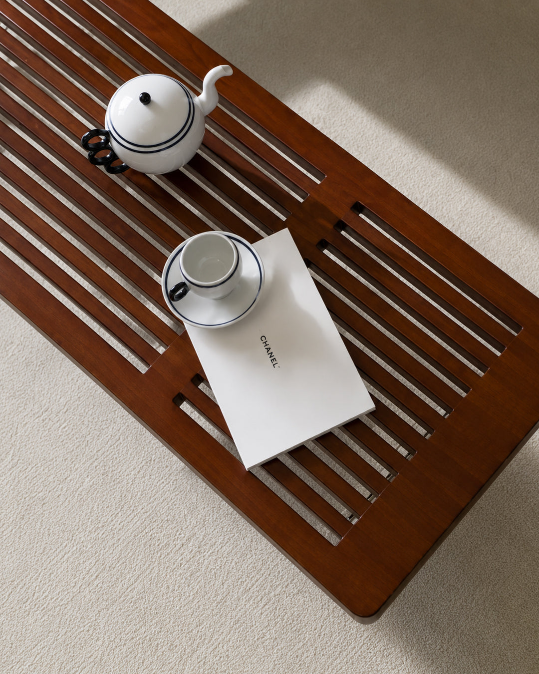 Top-down view of solid wood slat bench surface