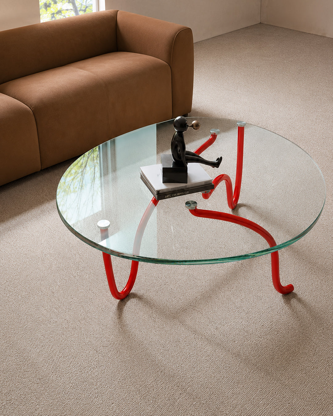 Side profile of sculptural pipe frame coffee table