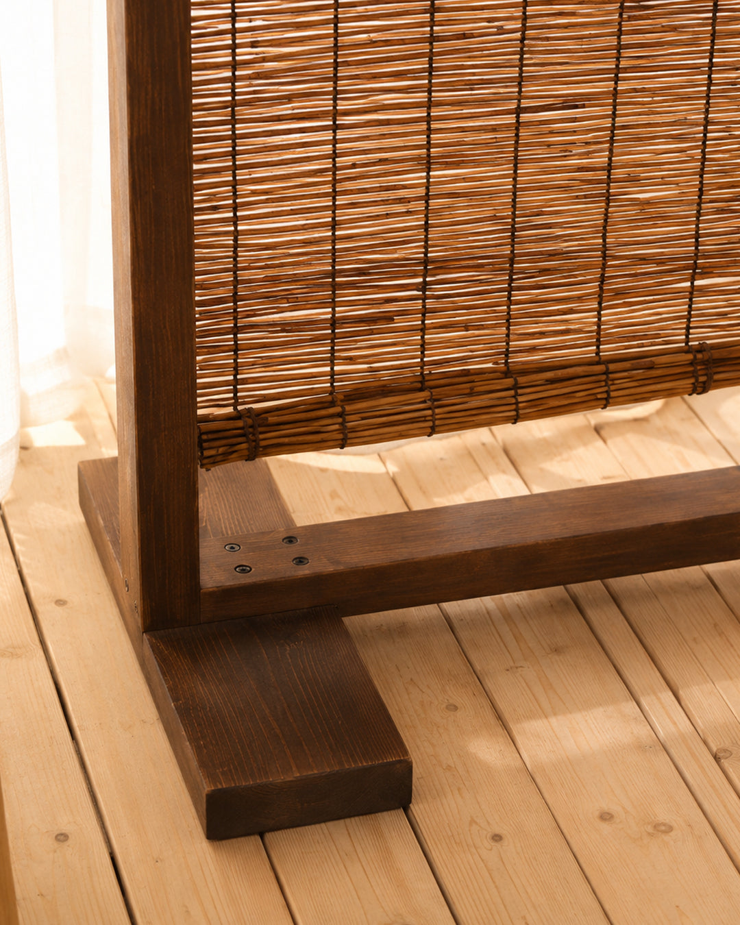 Reed room divider folded partially for compact storage