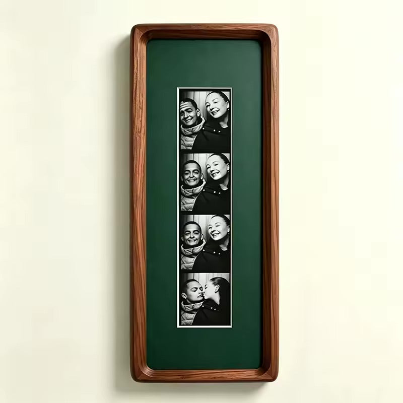 Dark green wood photo strip frame with key hooks, alternate studio angle