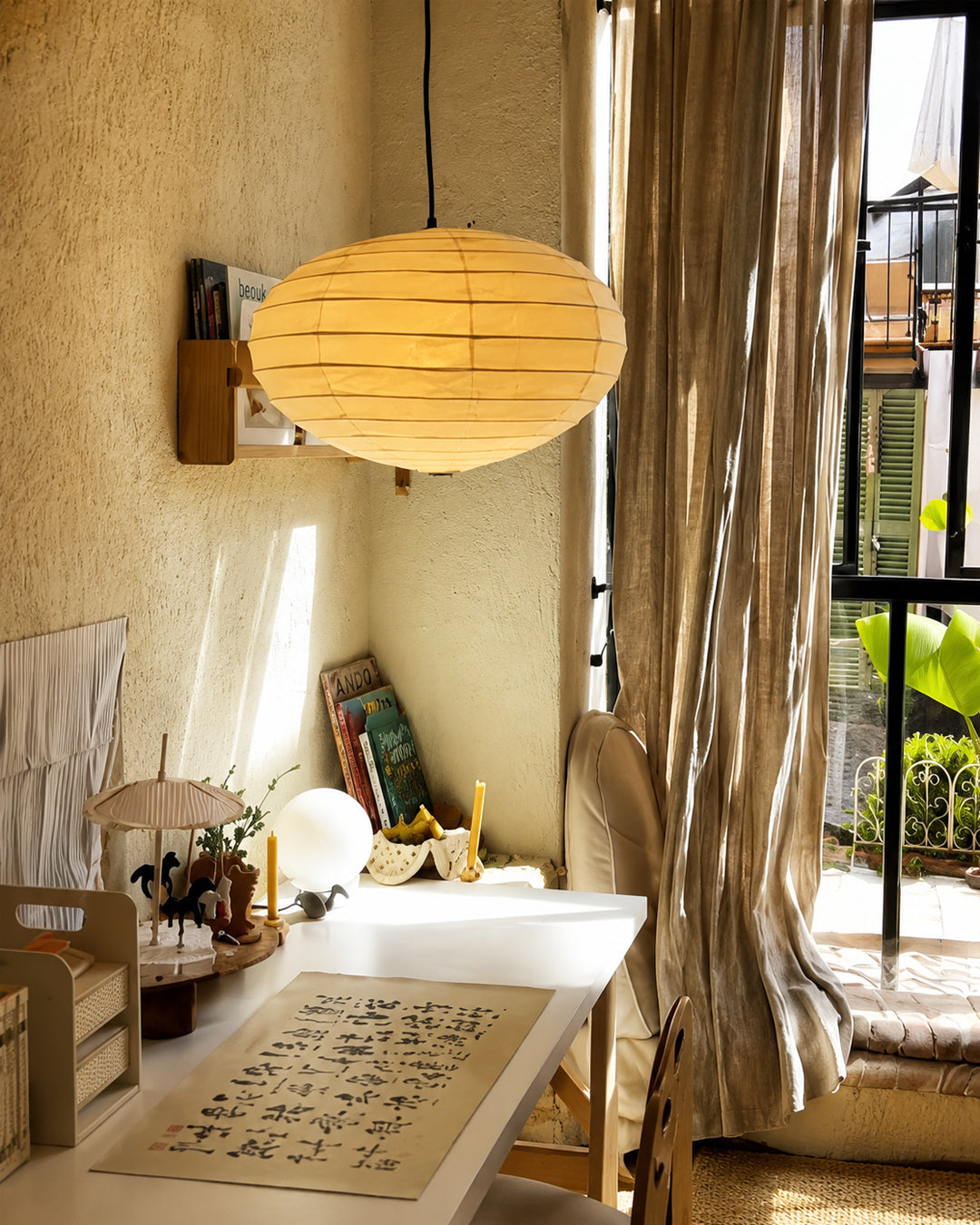 Rice paper pendant lamp illuminated, showing soft glow