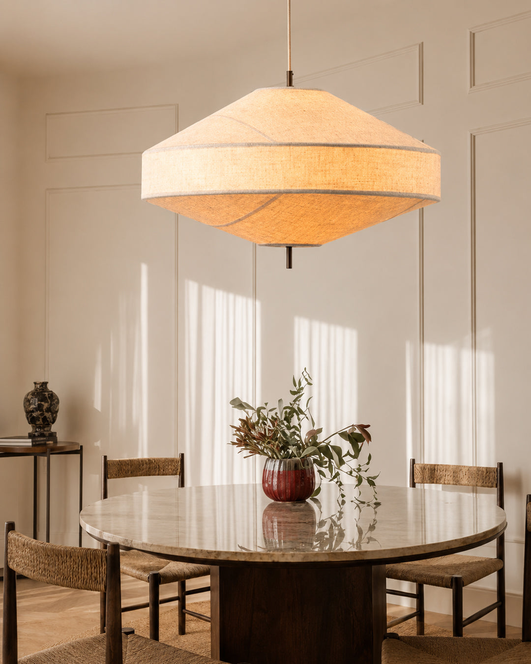 Linen pendant light styled in a living room