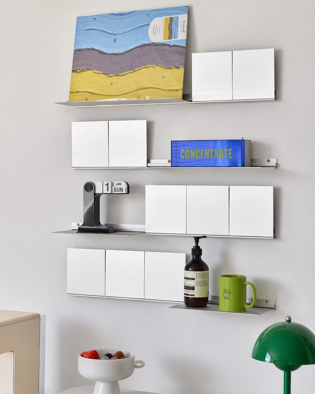 Wall shelf panels spaced wide apart configuration