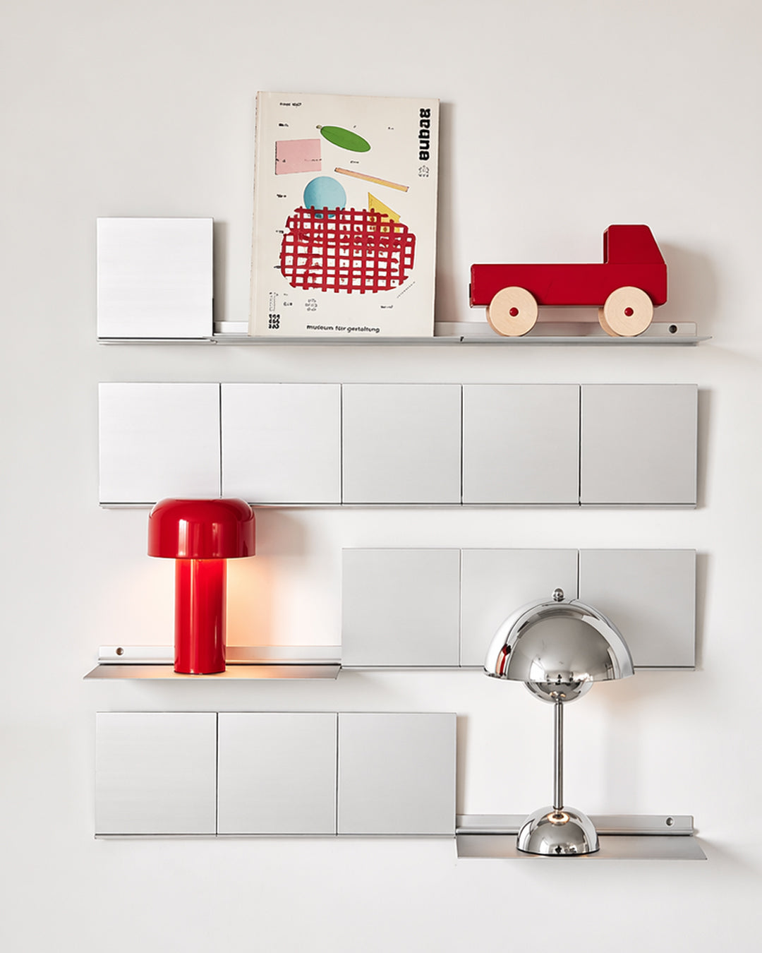 Modular wall shelf styled in a living room