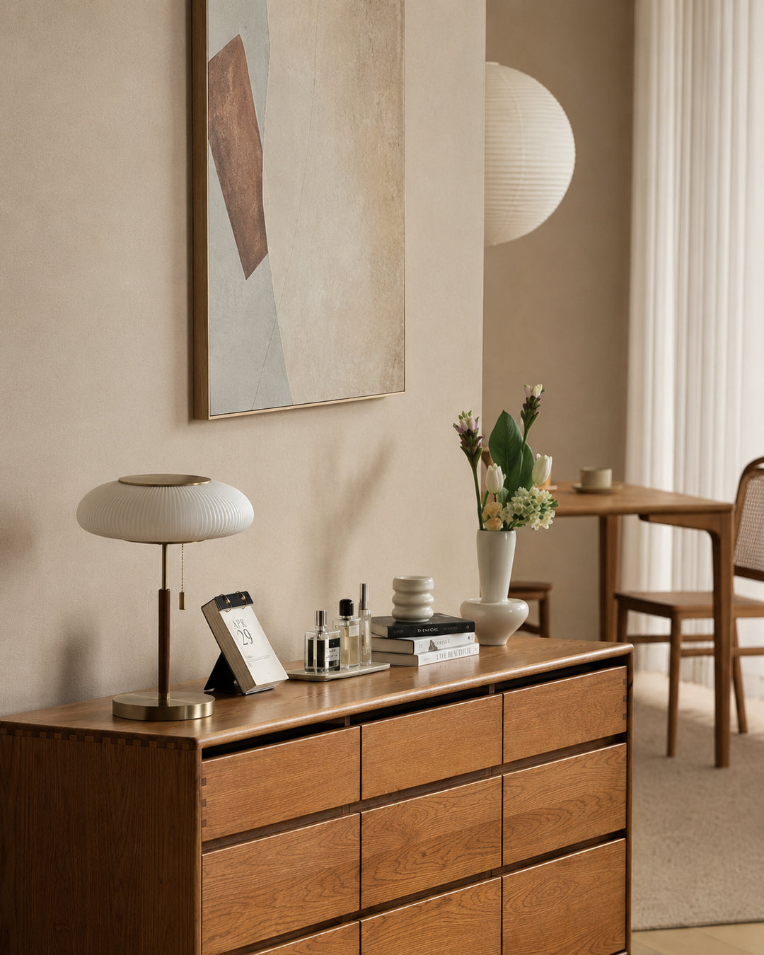 Ribbed glass table lamp illuminated, showing warm glow