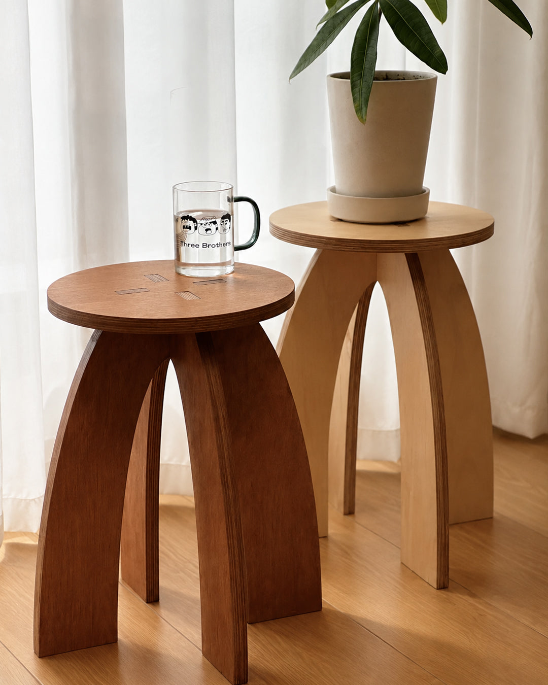 curved leg wood side table closeup detail shot showing arched leg craftsmanship