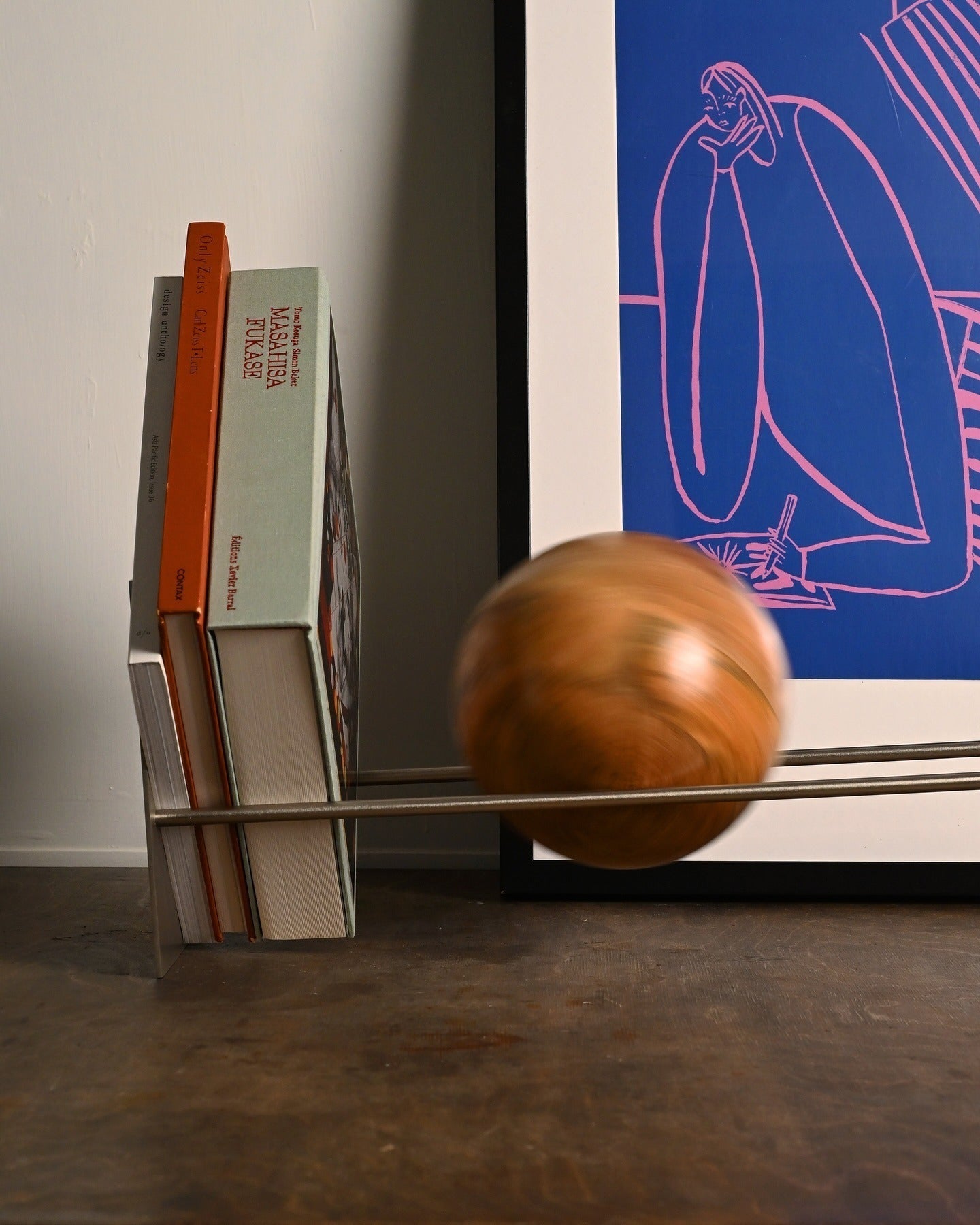 Red sphere bookend modern design object for bookshelf