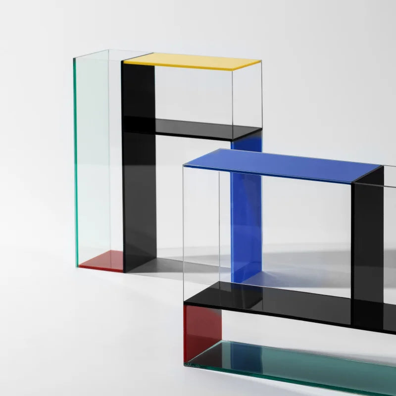 Color block glass vase styled alongside a matching piece