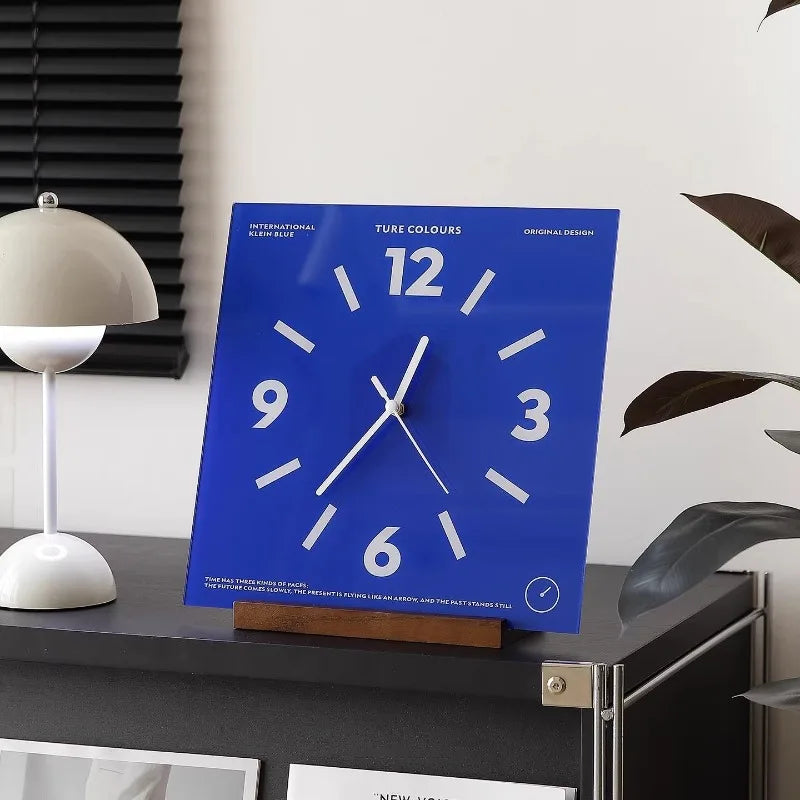 Close-up of silent movement hands on square wall clock face