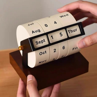 wooden desk calendar with rotating wheel & vintage look closeup detail shot showing texture and craftsmanship