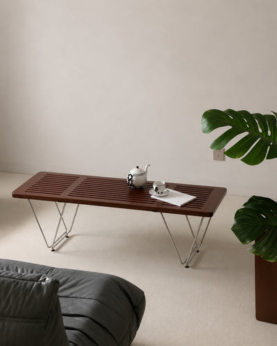 Slat bench styled at the foot of a bed