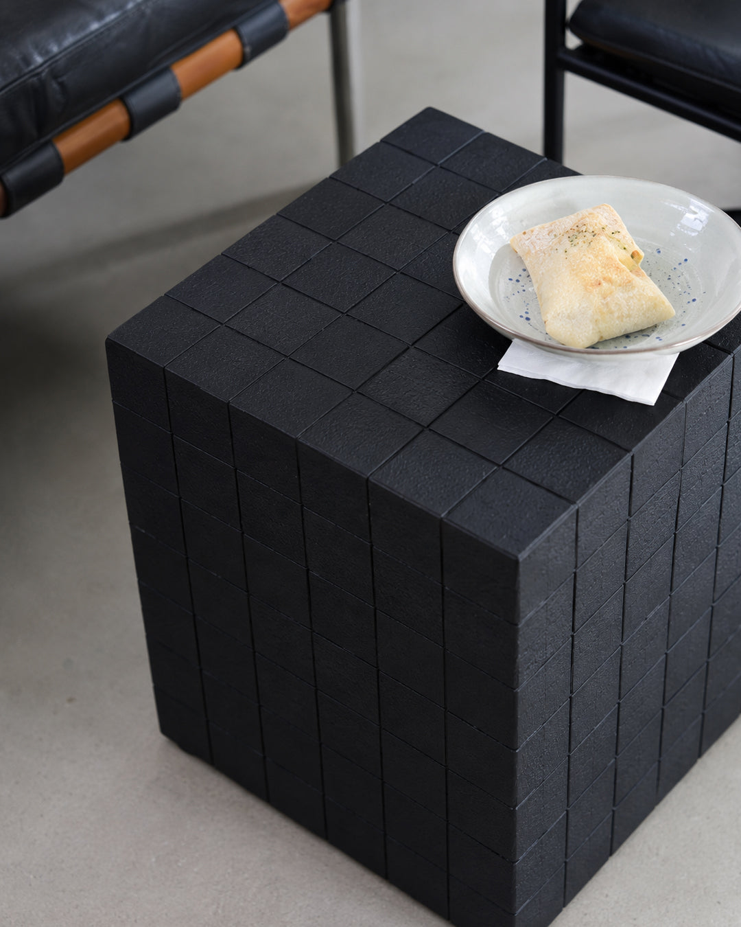 tile mosaic cube stool closeup detail shot showing grout line texture