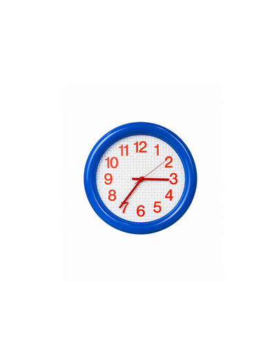 bold grid wall clock with thick round frame in blue - front view product photo