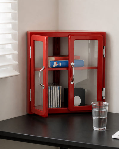 glass door corner cabinet shown styled on a desk with collectibles