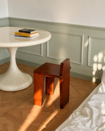 block form wood chair side profile view showing architectural silhouette