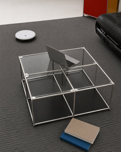 Modular glass cube table styled in a living room