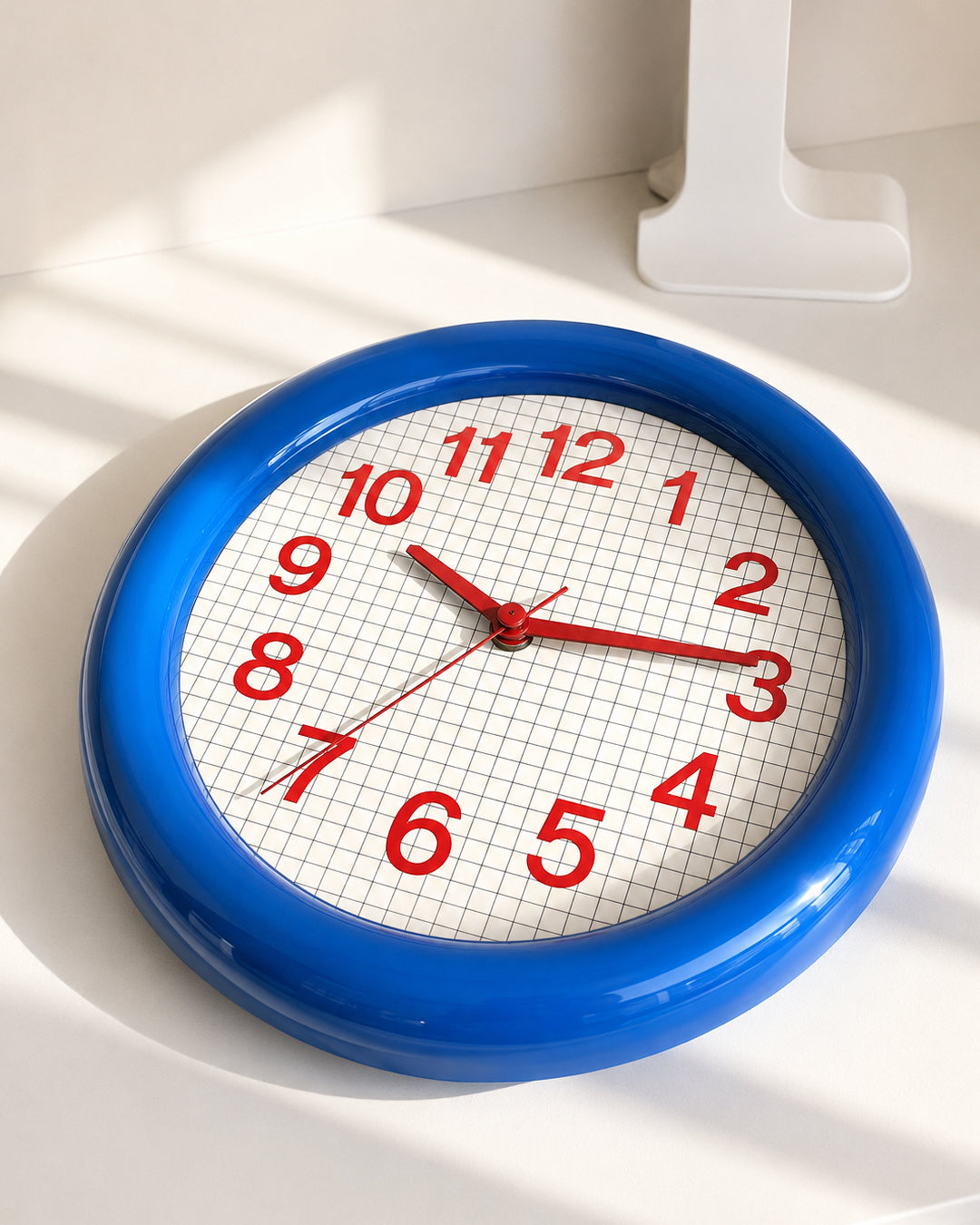 chunky bezel wall clock closeup detail shot showing thick frame texture
