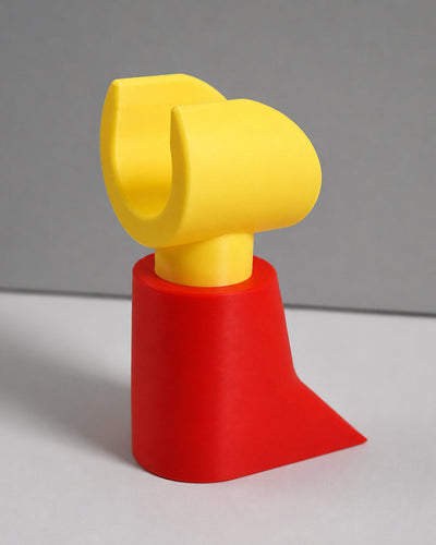 colorful controller display stand size reference photo next to everyday objects
