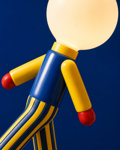 Resin figure table lamp styled on a desk