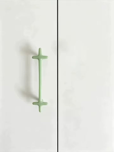 modern kitchen cabinet hardware in multiple vibrant colors
