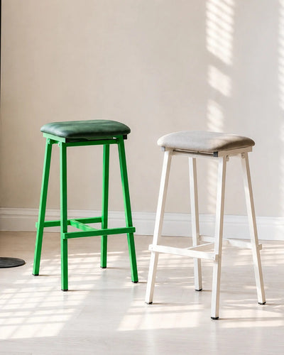 saddle seat bar stool shown paired in a set at a breakfast bar