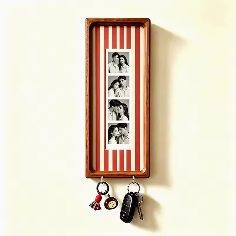 Red pinstripe wood photo strip frame with key hooks, studio shot