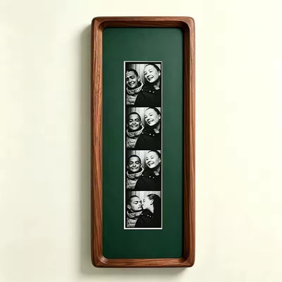 Dark green wood photo strip frame with key hooks, alternate studio angle