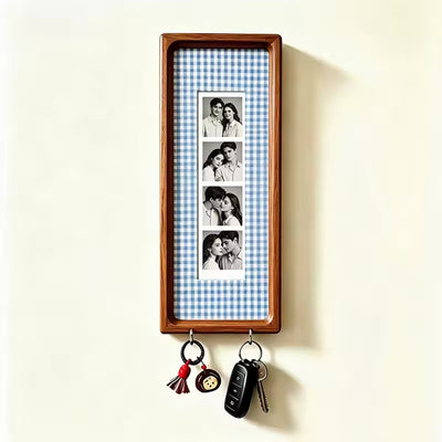 Blue check wood photo strip frame with key hooks, studio shot