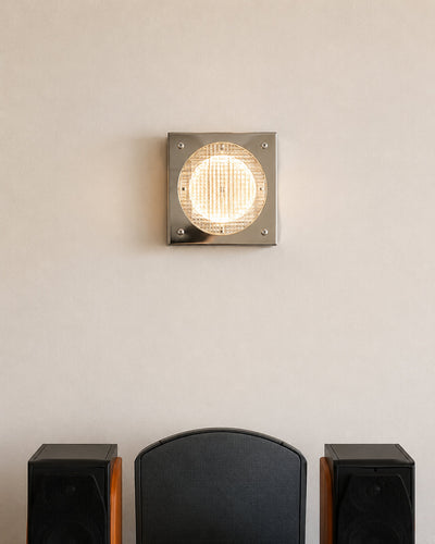 square wall sconce shown mounted in a hallway setting