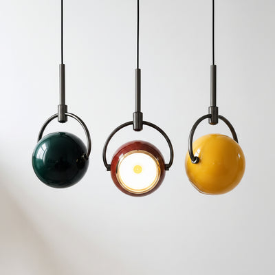 orb pendant light closeup detail shot showing cradle frame and glass shade