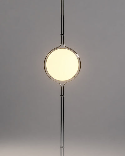 Tension pole lamp illuminated, showing warm glow