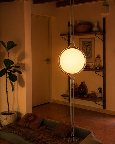 Tension pole lamp styled in a living room corner