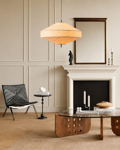 Linen pendant light illuminated, showing warm glow