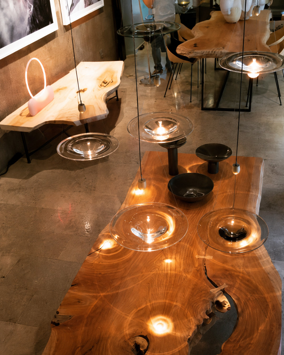 Multiple ripple glass pendant lights hung together