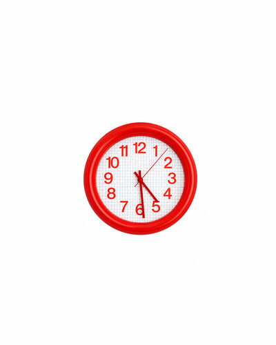 bold grid wall clock with thick round frame in red - front view product photo