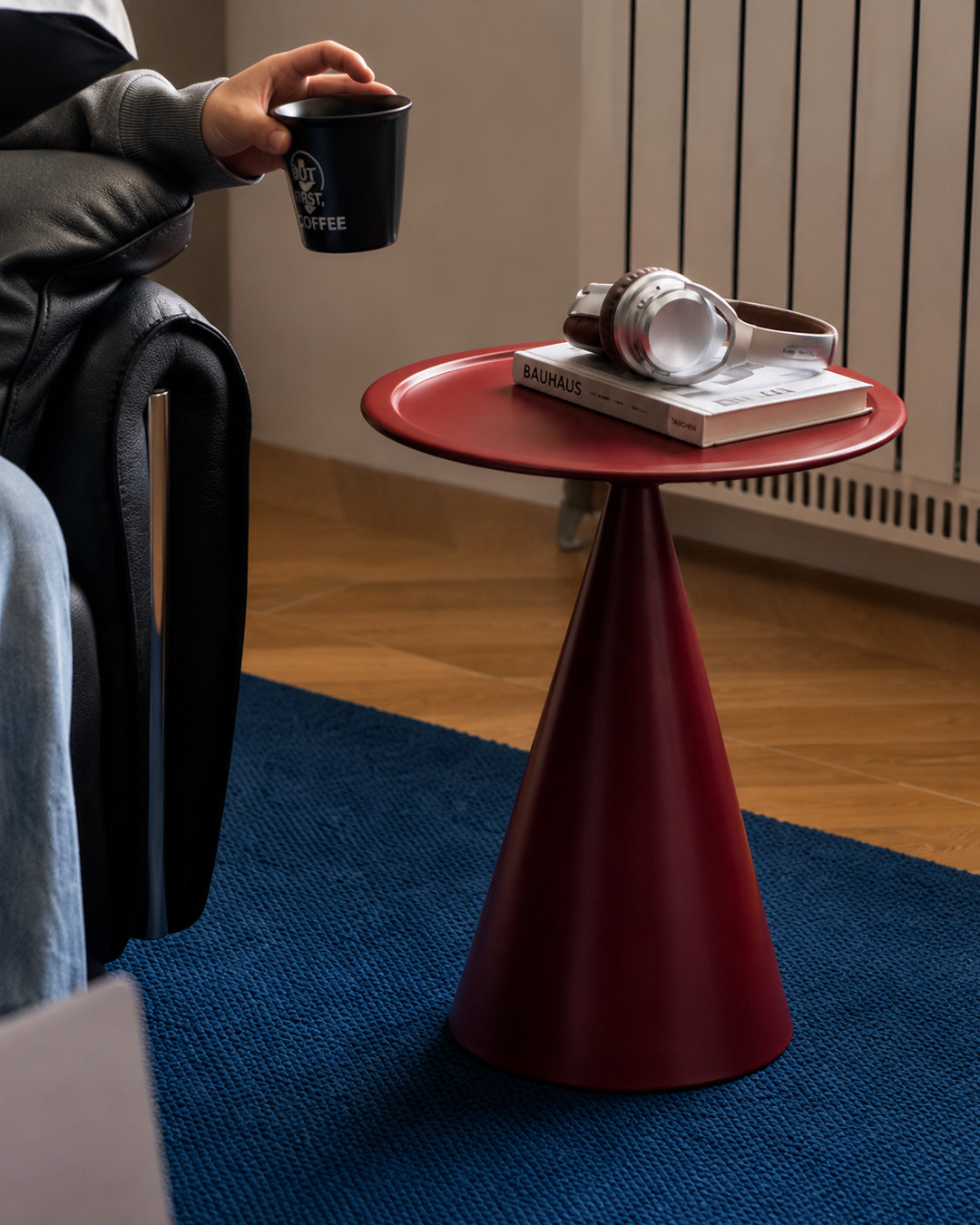 cone pedestal side table closeup detail shot showing tapered metal neck