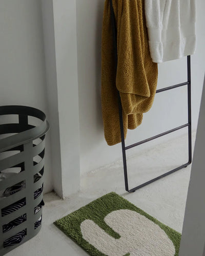 anti-slip elephant bath mat placed on bathroom floor