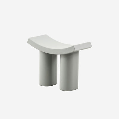 sculptural modern stool with curved seat design