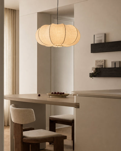 Silk paper pendant light illuminated, showing soft glow