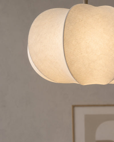 Side profile of petal-shaped silk paper pendant shade