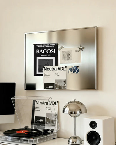 Wall panel styled with notes and photos attached