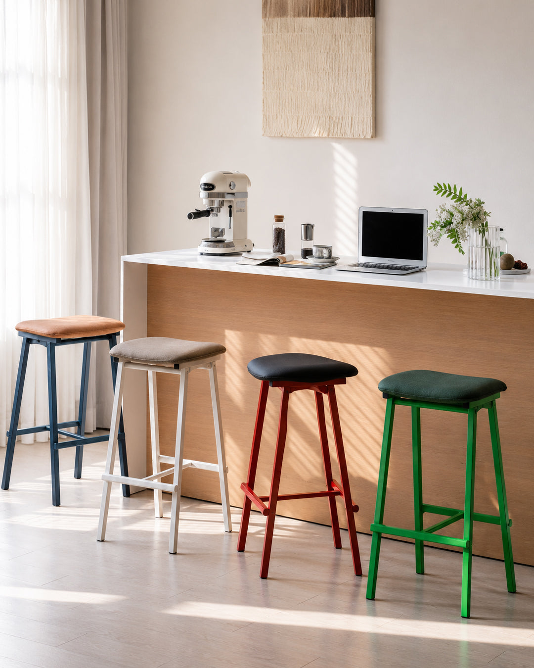 saddle seat bar stool shown styled at a kitchen island counter