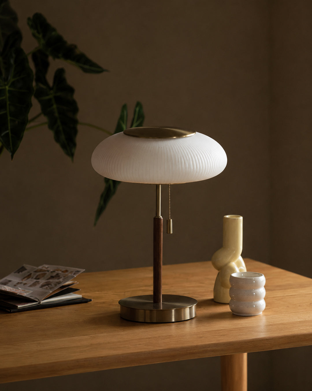 Side profile of ribbed glass dome table lamp