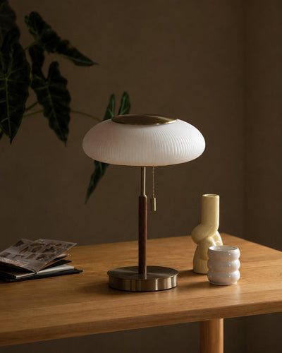 Side profile of ribbed glass dome table lamp
