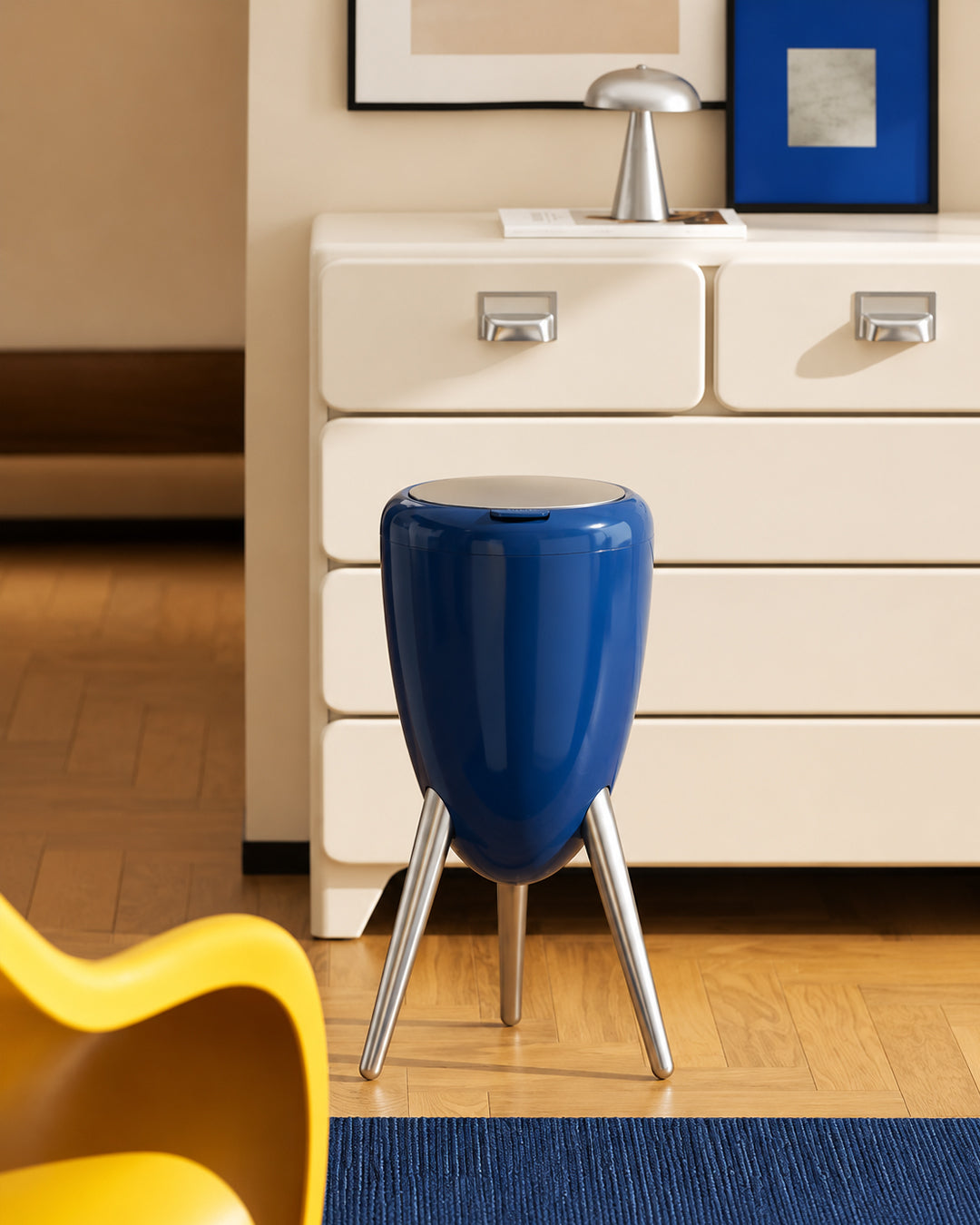 egg shape trash can shown styled in a modern living room corner