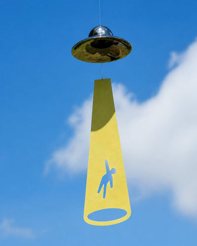 UFO wind chime hanging on a balcony